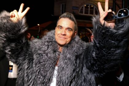 Robbie Williams arma disputa dos boybands mais duros