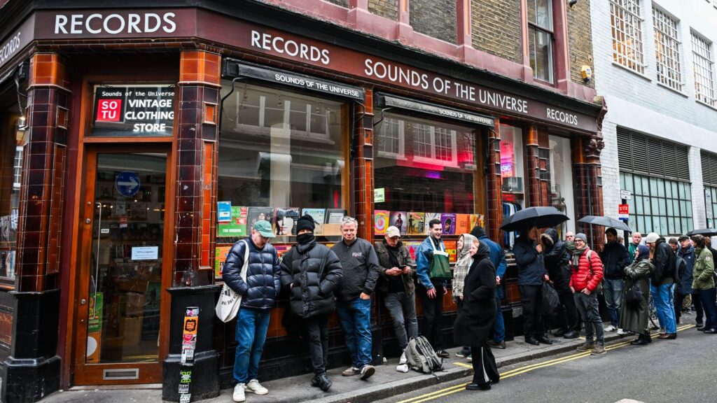 . Music fans gather outside the Sounds of the Universe record store, April 2026. Ben Montgomery/Getty Images