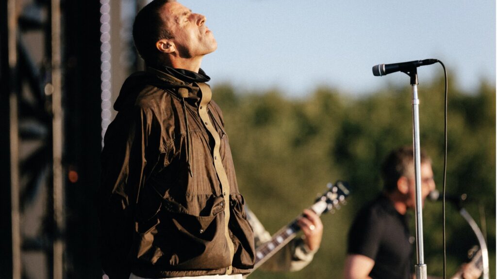 Oasis. Liam Gallagher performing live on stage with  at Manchester's Heaton Park
